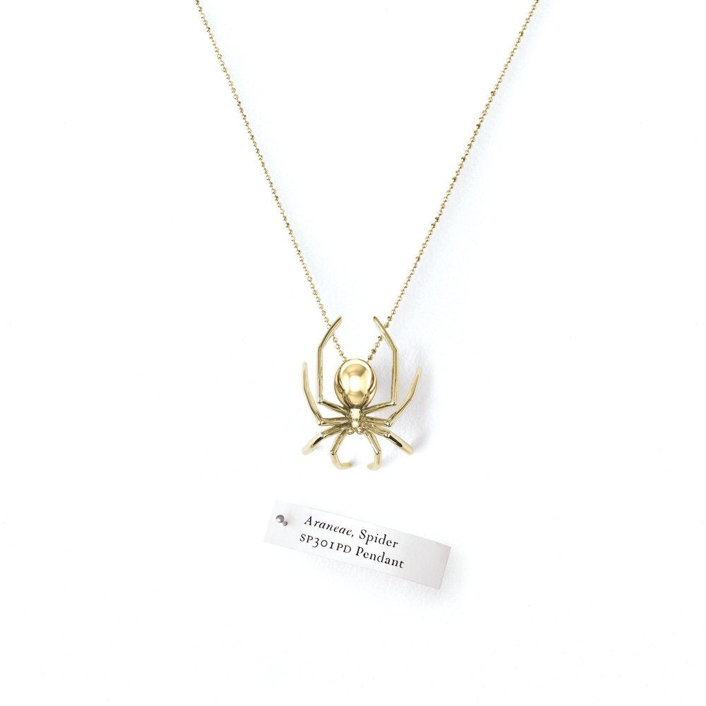 Gold spider pendant discount